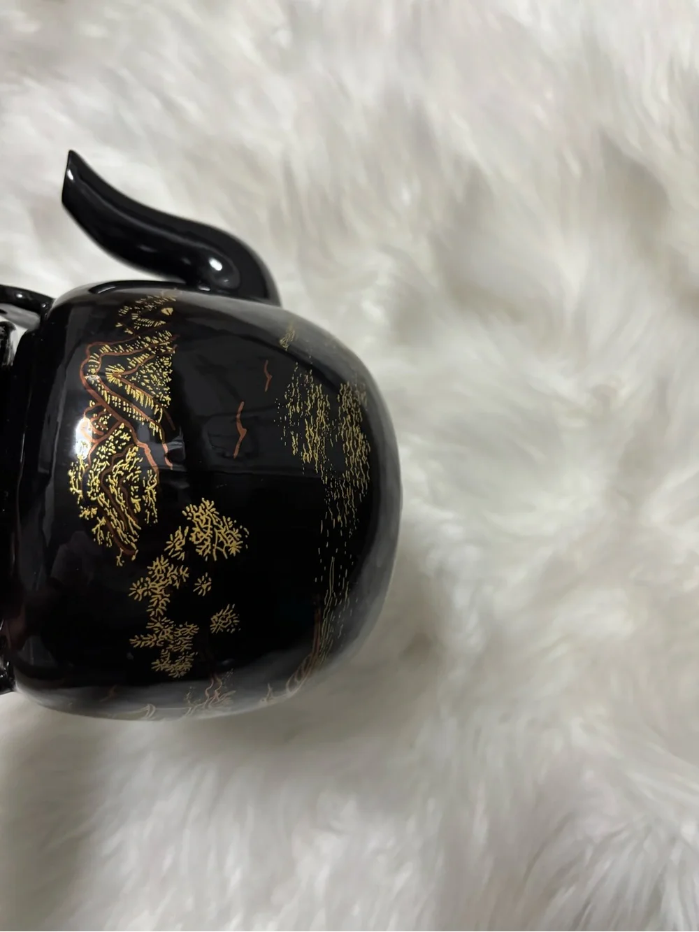 Black and Gold Ceramic Teapot with Woven Handle